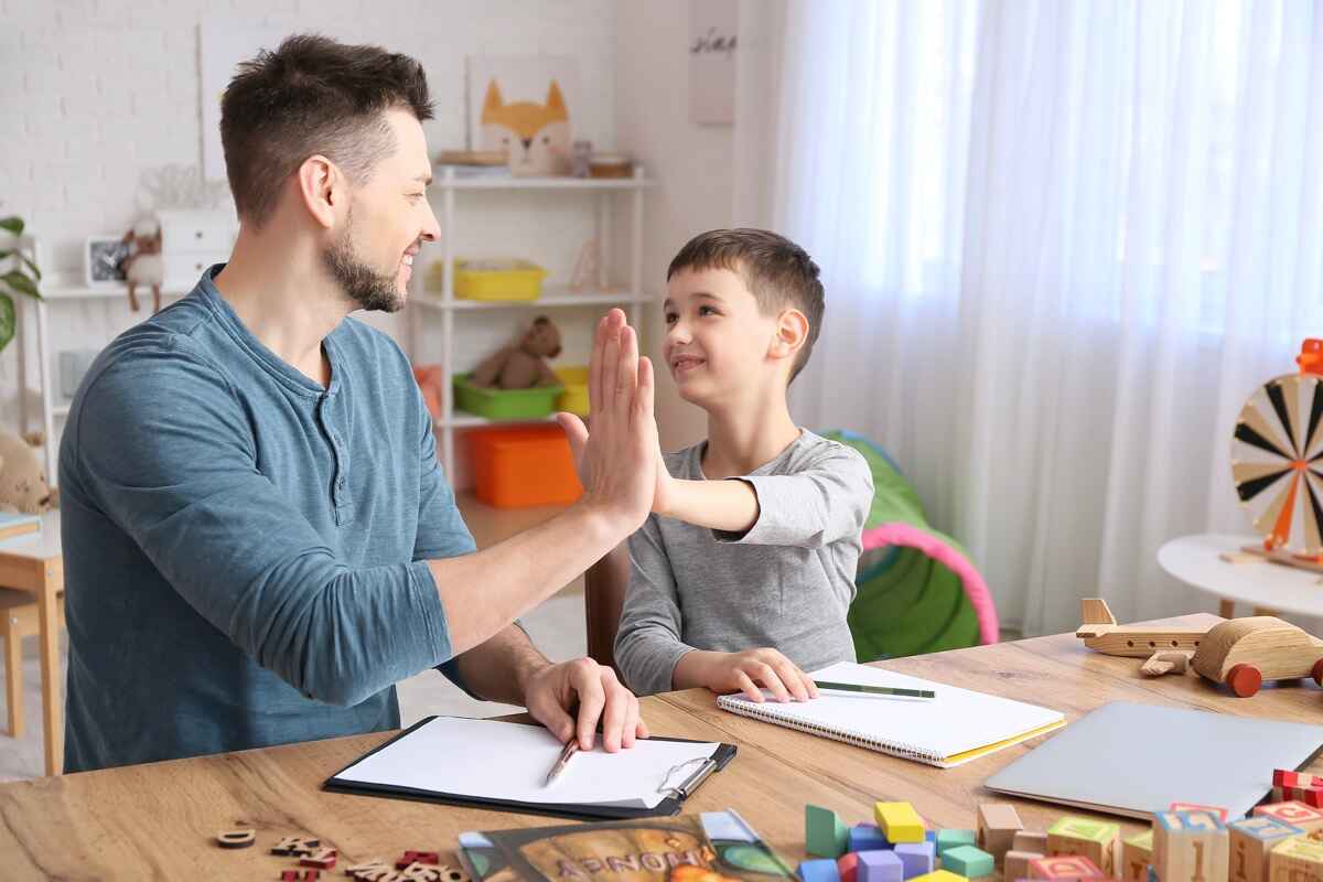 Father and son playing