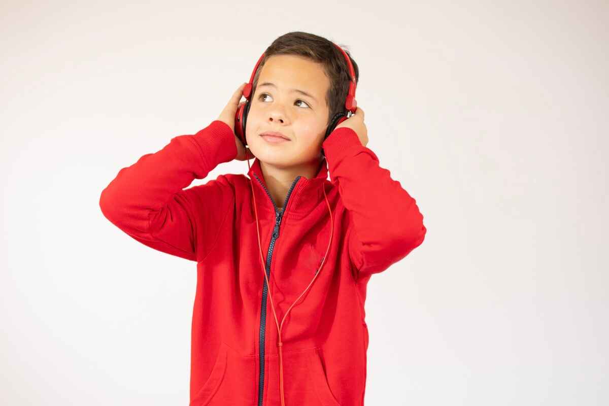 Boy wearing ear muffs